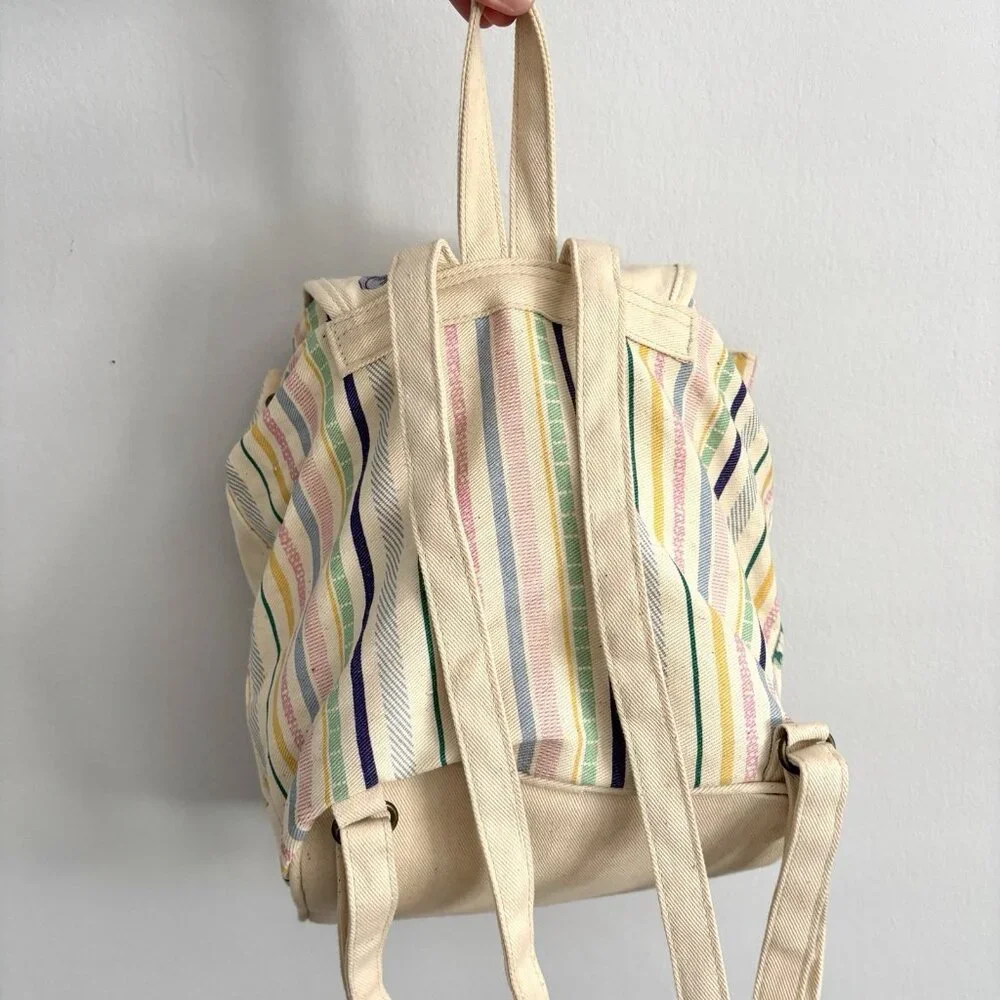 Carter’s Vintage Canvas Drawstring Backpack Cream Floral and Stripe Pattern